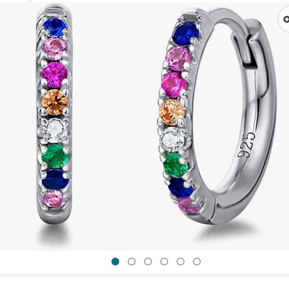 14k white gold plated sterling silver hoop earrings.